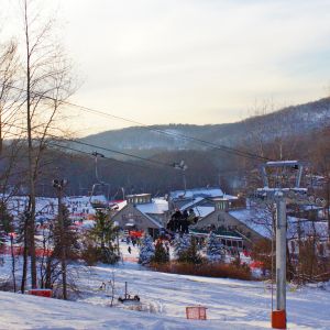 View from the Tomahawk Trail of the Tomahawk Express Quad and base lodge   Shawnee Mountain Ski Area